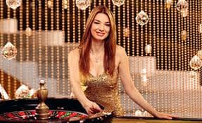 Dashboard platform burik menampilkan berbagai kategori olahraga, permainan live dealer, dan slot games